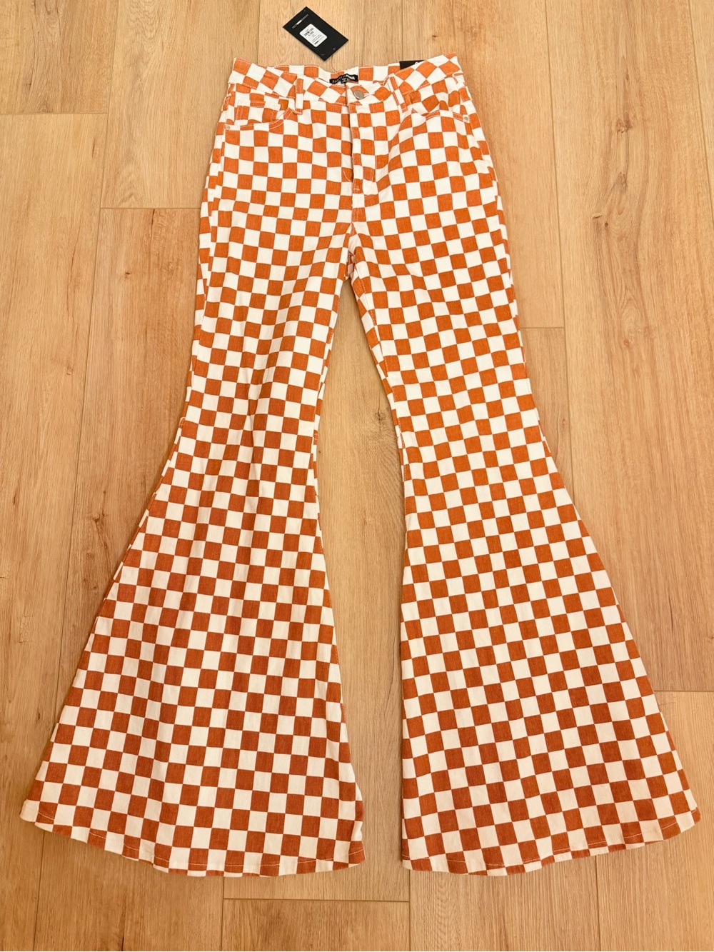Fashion Nova Women’s Orange and White Checkerboard Flared Jeans